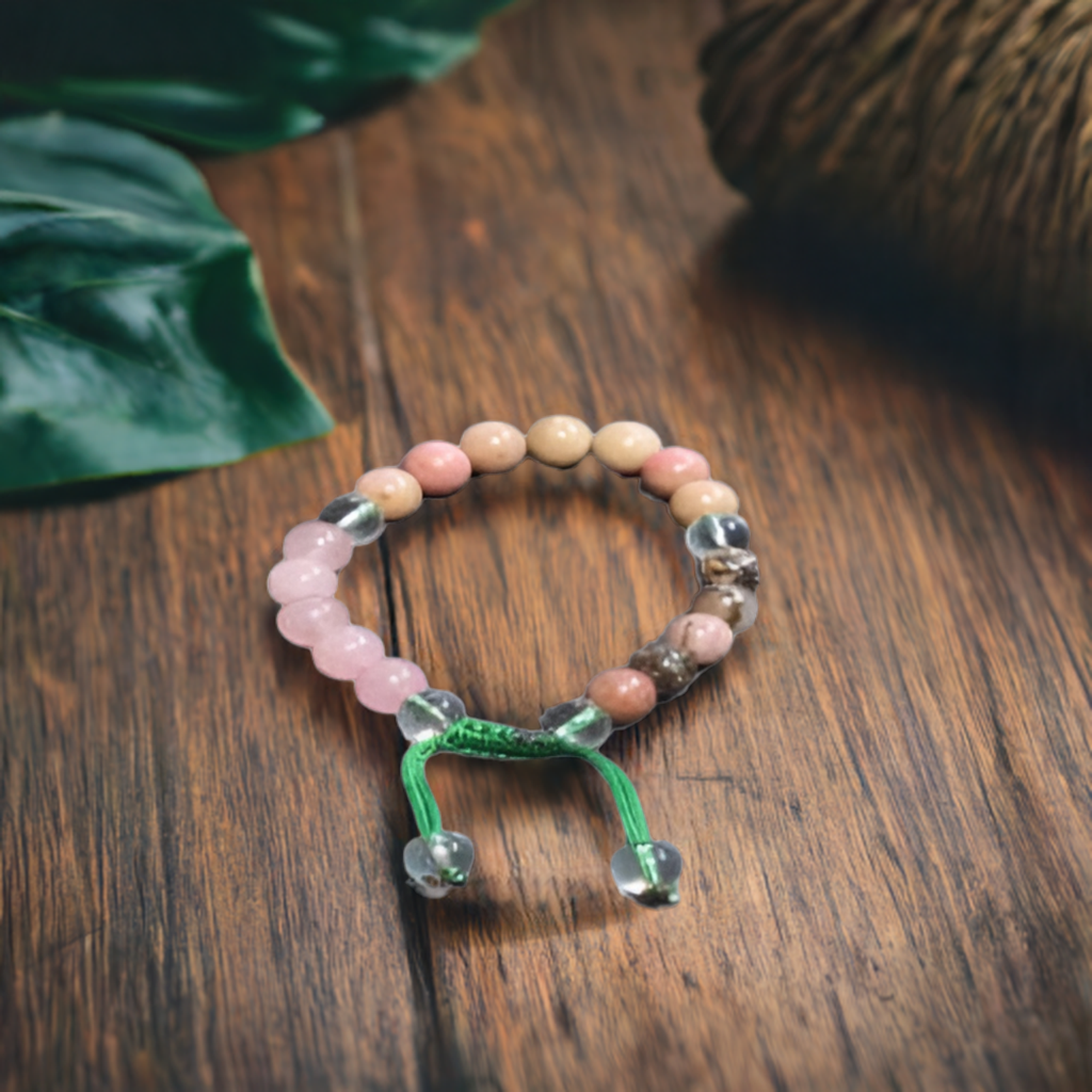 Harmony and Love: Rhodochrosite, Rhodonite, Clear Quartz & Pink Quartz Bracelet